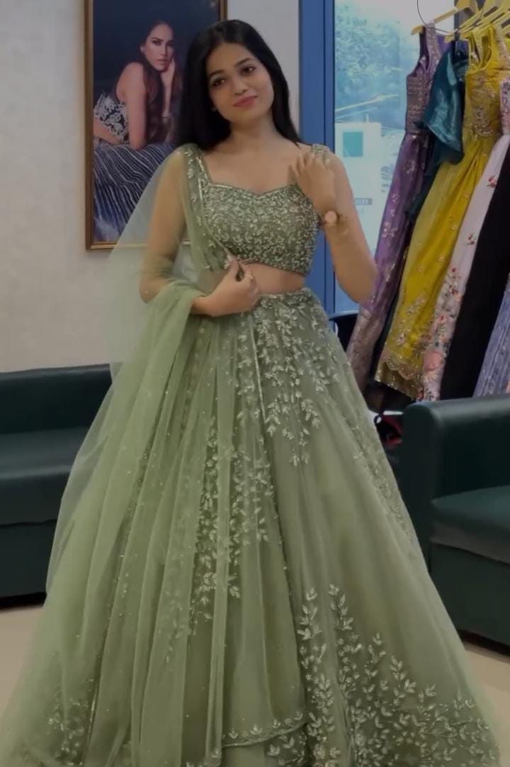 Soft Net Pista Green Color Lehenga Choli Set